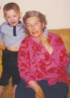 Brian Johnson has fun with his grandmother, Anne Purdy Hobbs
(Tisha), in a photo taken in the 1970s. Johnson has been working to
distribute copies of Dark Boundary, a book his grandmother wro