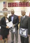 Courtesy photo Wasilla High School graduate Amanda Ostrom is
pictured with James Summers (Matanuska Masonic Foundation
president) and Lee Seagondollar (MMF treasurer). Ostrom received a
$1,50