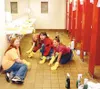 The ladies of CRISP work to renovate a run-down bathroom at
Wasilla High School recently. Submitted photo.