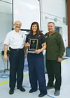 Responder of the Year Jessica Stewart poses for a photo with Chief James Steele and Mat-Su Borough Mayor Larry DeVilbiss. Courtesy Jon Burns