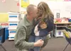 Tobe Marchione says hello to his daughter Isabelle during his
surprise visit to her class at Swanson Elementary Thursday.
Marchione has been deployed in Afghanistan and surprised both his
chi
