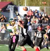 Houston lineman John Koenman knocks down a Rhett Sieverts pass during a 45-12 win over Seward Aug. 22 at Houston High School. JEREMIAH BARTZ/Frontiersman