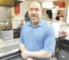 ROBERT DeBERRY/Frontiersman Wings ‘n Things owner Tracy Olsen
has brought the old Anchorage favorite to Wasilla. The restaurant
opened its doors on the corner of Boundary Street and the Parks