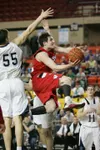ROBERT DeBERRY/Frontiersman Corey mock flys towards the basket
for two points during Tuesday's 4A state basketball semi final game
against the Soldotna Stars.