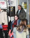 Shanna Emerson rings the Salvation Army bell outside Fred Meyer
recently. RINIDI WHITE/Frontiersman