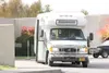 ROBERT DeBERRY/Frontiersman A MASCOT bus sits at a bus stop at
Mat-Su College. The transit company is in the process of setting up
a hotline for people to call to get answers about routes and