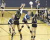 Palmer’s Mariah McNamara splits a pair of Colony blockers during a 3-0 win over the Knights at Palmer High on Tuesday. JEREMIAH BARTZ/Frontiersman