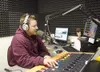 KMBQ program director Danny Ryan works the mic and soundboard
Friday afternoon in Wasilla. (ROBERT DeBERRY/Frontiersman) Robert DeBerry
