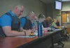 Alaska State Troopers, juvenile justice officers and health services employees take a quiz on mental health first aid at the start of an eight-hour training facilitated by retired Anchorage P