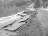 A photo taken shortly after the Nov. 3 earthquake shows damage
to the Tok Cutoff. Although the road is still closed to nighttime
traffic, crews are working steadily and plan to fully reopen t