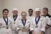 Mat-Su Career and Technical High School students Claire East, Patrick Forman, Sara Ladner, Avery Ballais and Jennika Conway stand with their teacher, Chef Mike Graham after winning the 2015 A
