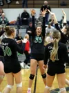Colony's Liyah Pilgrim (33) celebrates a point with her teammates during a win over Wasilla in the Northern Lights Conference championship match. Bruce Eggleston/matsusports.net