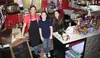 From left, Slot’s Deli owner Chris Daw, his son Rocco and employee Courtney May pose for a photo Friday at the eatery, located in the Mat-Su Regional Outpatient Center off Bogard Road. The de