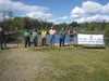 John Schirack, Lonny Jackson, Bill Kramer, Forrest Shumaker, Chuck Kaucic and others pose for a photo during a dedication ceremony at the Jay Nolfi Fish Creek Park in Big Lake Thursday follow