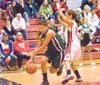 Colony senior guard Kate Klapperich tries to move past Wasilla's
Hilary Apangalook during Saturday's game at Wasilla High School.
(ROBERT DeBERRY/Frontiersman)
