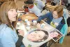 Courtesy photo/Karen Carney Karen Carney, left, and daughter
Katie paint a portRait of Andrea Carney to be displayed on the
Parade of Life float in Friday'€™s Tournament of Roses Parade.