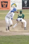 Mat-Su third baseman Jed Lowrie scoops up a ball thrown from the
outfield as Anchorage Glacier Pilot catcher Jonathan Higashi slides
into third. Photo by JEREMIAH BARTZ/ Frontiersman.