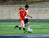 Houston sophomore Denali Whitted works the ball past a defender during a match against Seward during the 2018 season. After Houston was forced to cancel its girls soccer season, Whitted and a