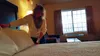 Grand View Inn &amp; Suites General Manager Sandy Joynes fluffs a pillow in a room at the hotel Dec. 11. Joynes said she opposes a bed tax increase, and even went so far as to question the ex