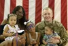 Spc. Zachary Cross, a tank system maintainer, assigned to the 1st Battalion, 67th Armor Regiment “Death Dealers”, 3rd Armored Brigade Combat Team, reunites with his family during a homecoming