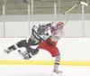 ROBERT DeBERRY/Frontiersman Wasilla forward Matthew Friese
collides with Colony forward Risto Paatsama during the second
period of Thursday's game at the Curtis C. Menard memorial II
Memorial