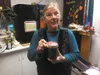 Patti Hurt, one of the founding members of the Trinity Lutheran Church in Palmer, with a jar of her award winning dilly beans, a favorite every year at the church's holiday bazaar, which cele