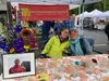 Stacie Smiley, left, and Diane Ziegner, advisory board members of the Jessica Stevens Community Foundation, staff an information booth at the Sunshine Community Health Center fair. Named to h
