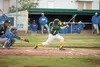 Mat-Su Miners shortstop Erik Harbutz watches as he sends the ball into the outfield during Monday's game against the Anchorage Glacier Pilots at Heromon Brothers Field in Palmer. ROBERT DeBER