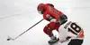 Wasilla forward Luke Schruf skates the puck away from West's James Batman during a 4-2 loss to the Eagles Friday in the 4A state semifinals. MatSuSports.net