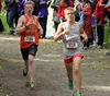 Gabe Garboden, a junior at Marist HIgh School in Eugene, Oregon, runs ahead of West Anchorage's Everett Cason midway through the Division I boys' race of the Palmer Invitational at Palmer Hig