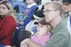 GREG JOHNSON/Frontiersman Richard Payne and his daughter
Catherine watch and listen during Saturday’s 9-11 remembrance
service in Wasilla.
