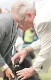 ROBERT DeBERRY/Frontiersman Judge Stephen J. Hubbell inspects
the teeth of Jake during the Cook Inlet Kennel Club Dog Show
Saturday at the Alaska State Fairgrounds in Palmer.