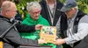 Alaska’s 2024 Farm Family of the Year recipients Bruce and Vickie Bush accept their plaque from Matanuska Valley Federal Credit Union CEO Ed Gravley. J. David McChesney/Frontiersman