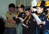 Wolves Den Scouts lead the crowd singing "God Bless America."
Photo by Jen Ransom/Frontiersman.