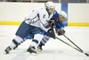Palmer senior forward Zane Jerman and Soldotna’s Stephen Endsley battle for the puck during Friday’s semifinal game of the North Star Conference Championships at the Curtis C. Menard II Memor