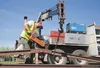 R&amp;S Railworks Inc. employee Duane Dennis grinds the bolts off a section of railroad track in downtown Palmer. A group called The Palmer Colony Express Train wants to see rail service to t
