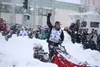 Jessie Holmes follows his team in downtown Anchorage during the Iditarod's ceremonial start. Kyle Wilkinson/For the Frontiersman