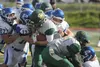 A group of Palmer Moose work to tackle Service running back Jacob Wade during a loss to the Cougars Aug. 19, 2017. The Moose return home to host Kodiak Friday at 7 p.m. at Palmer High. Jeremi