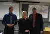 MATCOM communications manager Jacob Butcher, dispatcher Amy French and Wasilla Mayor Bert Cottle pose for a photo during a Wasilla City Council meeting. Frontiersman file photo