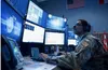 Alaska Air National Guard Senior Airman David Warren, 176th Air Defense Squadron surveillance technician, monitors Alaska airspace using a AN/FYQ-156 Battle Control System at the JBER-based 1
