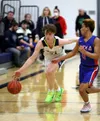 Redington's Logan Seymore drives the ball down the floor during a win over Sitka. Bruce Eggleston/matsusports.net