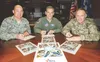 Air Force Col. George “Dutch” Dietrich, commander of Joint Base Elmendorf-Richardson and the 673d Air Base Wing, JBER, Alaska, left, Air Force Lt. Gen. Kenneth S. Wilsbach, commander of Alask