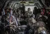 French Soldiers from the 1st Artillery Regiment and CH-47 crew members from B Co “Big Windy,” 1-214th General Support Aviation Battalion load a French artillery piece onto a 12th CAB Chinook 