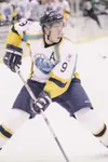 Alaska blueliner Jake Parenteau shoves the puck toward the net
during a win over Kenai River last week. On Thursday, Parenteau
scored the game-tying goal in a 5-4 win over Springfield during 