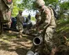 U.S. Air Force Tech. Sgt. Jaime, 35th Civil Engineer Squadron water and fuel system craftsman, moves the new pipe for setup as part of the Water and Fuel Expedient Repair System (WaFERS) trai