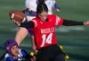 Wasilla's Mikayla Compton reaches for a gain during a loss to Lathrop in the 2024 ASAA state flag football tournament. J. David McChesney/Frontiersman