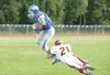 ROBERT DeBERRY/Frontiersman Palmer junior Jim McCall completes
the pass as Dimond's Tyler Cruz gets the tackle. Palmer plays South
Friday at the Anchorage Football Stadium at 7 p.m.