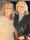 Lynne Woods with Cindy Bettine, winner of the 2011 Tourism Angel
Award. Bettine was part of the group that started the Mat-Su
Convention and Visitors Bureau 25 years ago. (JUSTIN
SAUNDERS/Mat