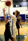 Palmer's Alyssa Clark goes to the basket during a win over East Anchorage. Courtesy of Bruce Eggleston/matsusports.net