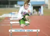 ROBERT DeBERRY/Frontiersman Palmer freshman Lanisha Wuitschick
clears a hurdle during practice Thursday afternoon at Palmer High
School.